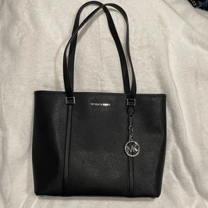 Michael Kors Black Sady Purse. Saffiano leather with silver accents